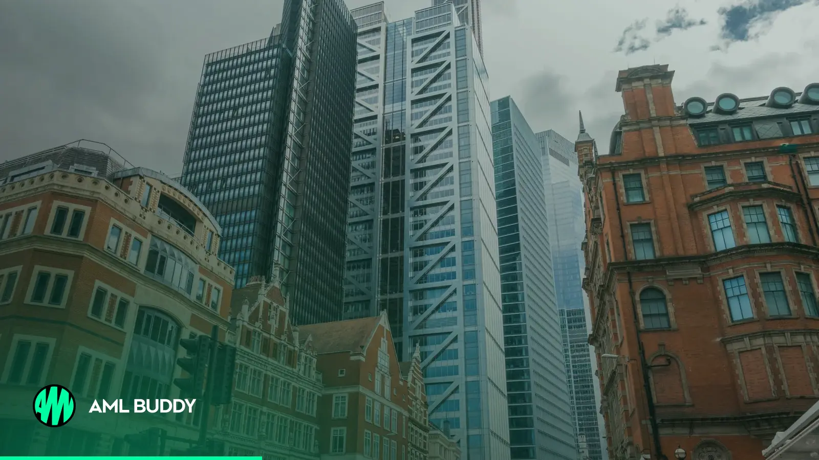 Modern office towers beside red-brick Victorian buildings in the City of London