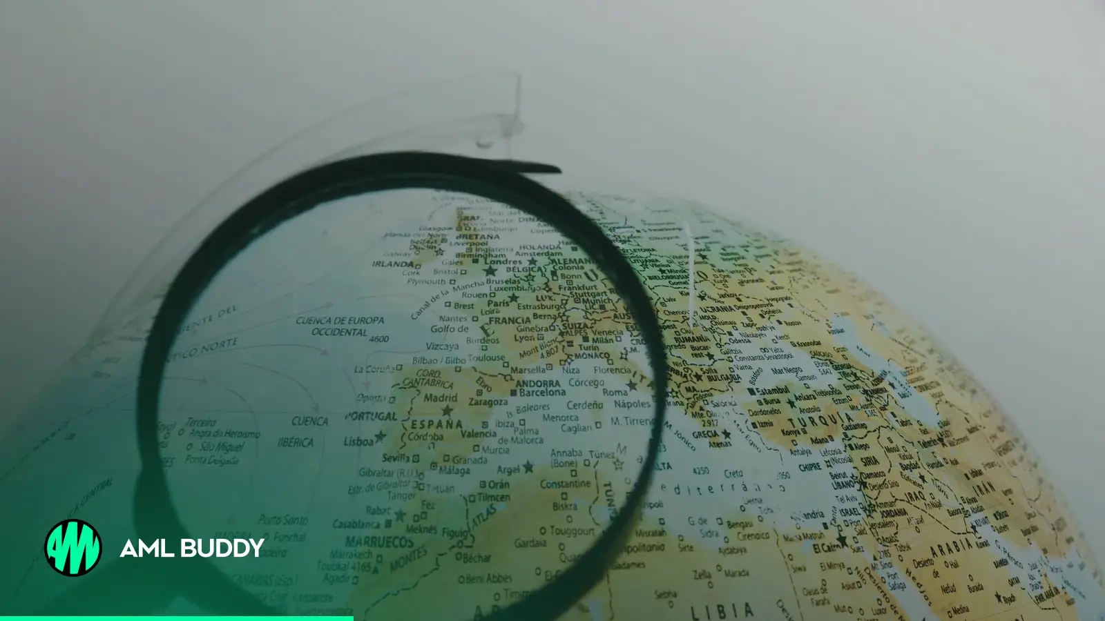 A magnifying glass resting beside a world globe